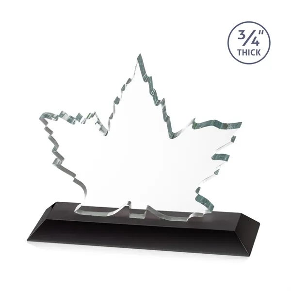 Stunning Starfire Crystal formed into a beautiful maple leaf mounted on... from ASI 84592 St Regis Group / St Regis