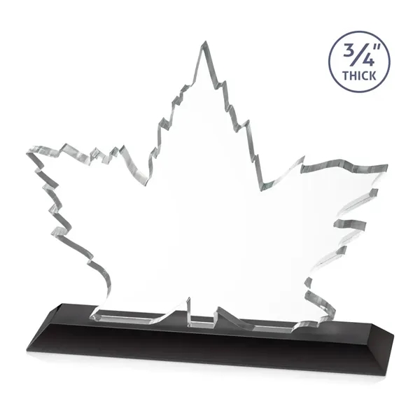 Stunning Starfire Crystal formed into a beautiful maple leaf mounted on... from ASI 84592 St Regis Group / St Regis
