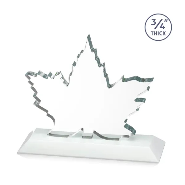 Stunning Starfire Crystal formed into a beautiful maple leaf mounted on... from ASI 84592 St Regis Group / St Regis
