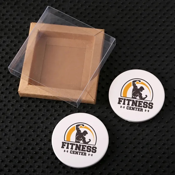 Two-piece ceramic absorbent car coaster set in elegant kraft paper box... from ASI 61966 HPG / Beacon Promotions