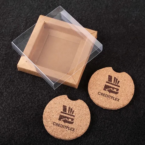 Two-piece cork coaster with thumb notch in elegant Kraft paper box... from ASI 61966 HPG / Beacon Promotions