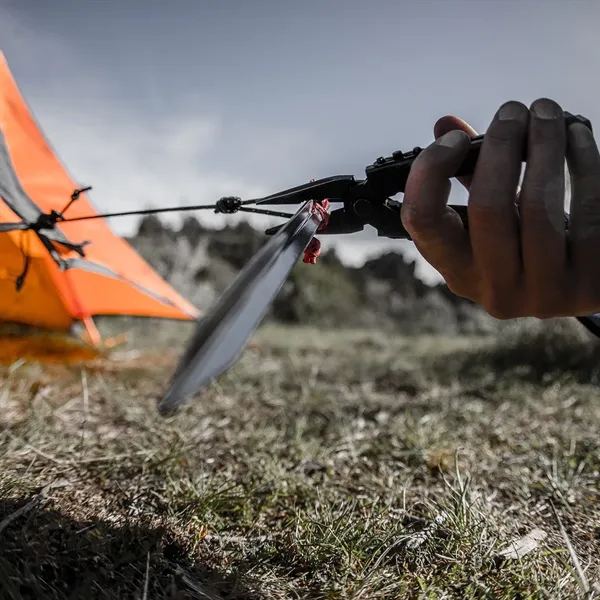 Black multi-tool with needle nose pliers, blade, file, saw, bottle/can opener,... from ASI 46170 Compass Industries Inc