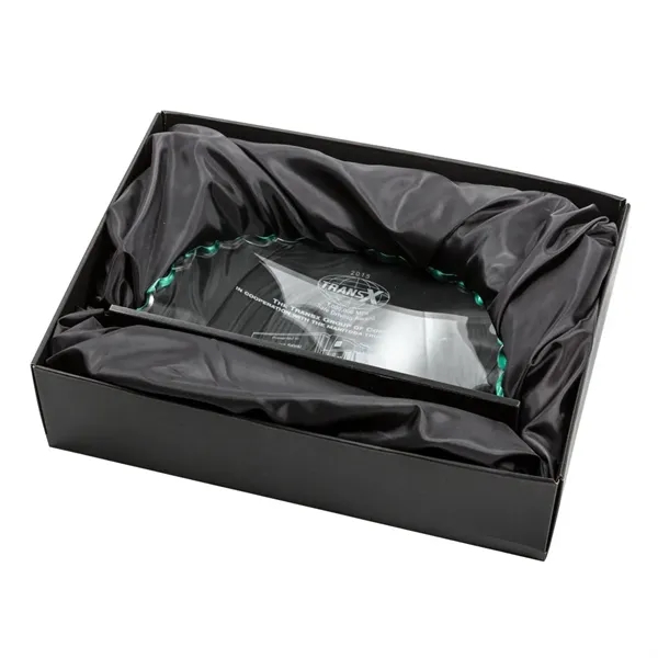 Jade curved award with chipped and polished edges on a marble... from ASI 84592 St Regis Group / St Regis