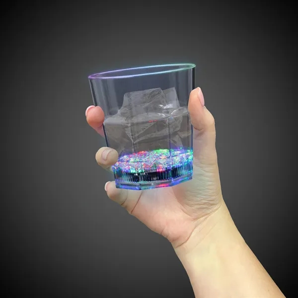8 oz. clear plastic rocks glass with built-in, flashing multi-colored LED... from ASI 42016 Brighter Promotions Inc