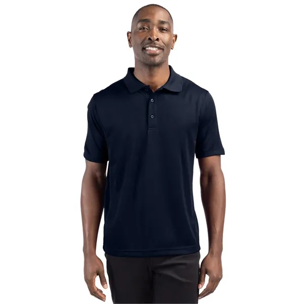 Men's polo with short sleeves, moisture-wicking performance, 3-button placket, and rib-knit... from ASI 47965 Cutter & Buck