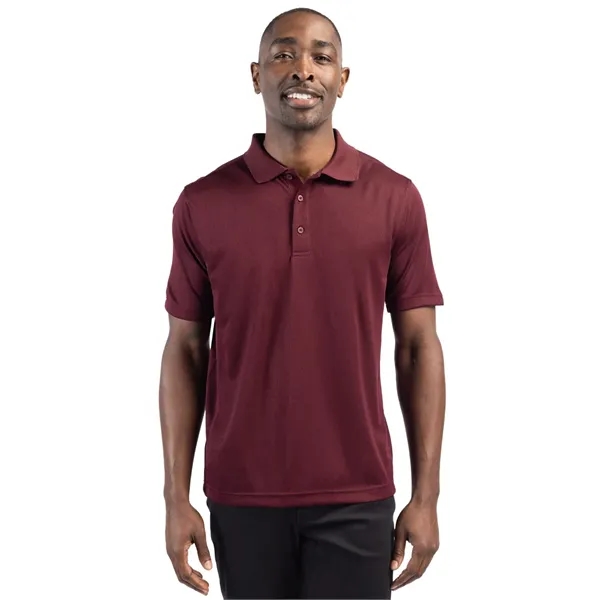 Men's polo with short sleeves, moisture-wicking performance, 3-button placket, and rib-knit... from ASI 47965 Cutter & Buck