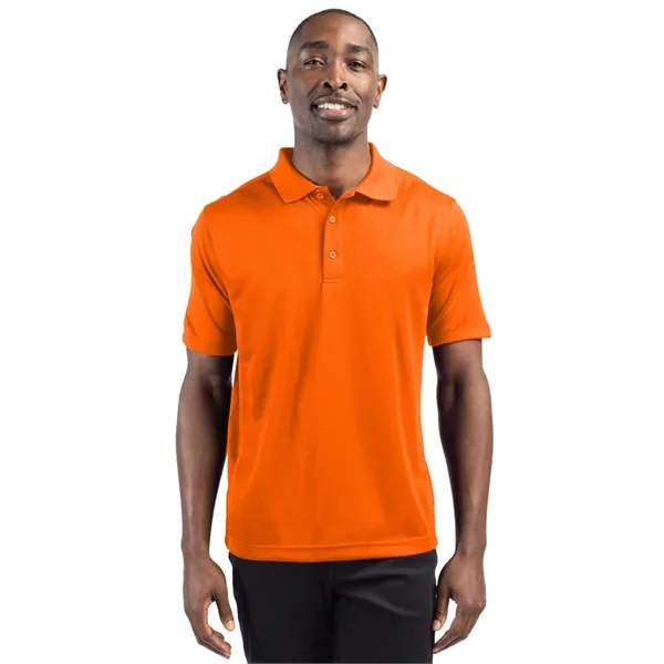 Men's polo with short sleeves, moisture-wicking performance, 3-button placket, and rib-knit... from ASI 47965 Cutter & Buck