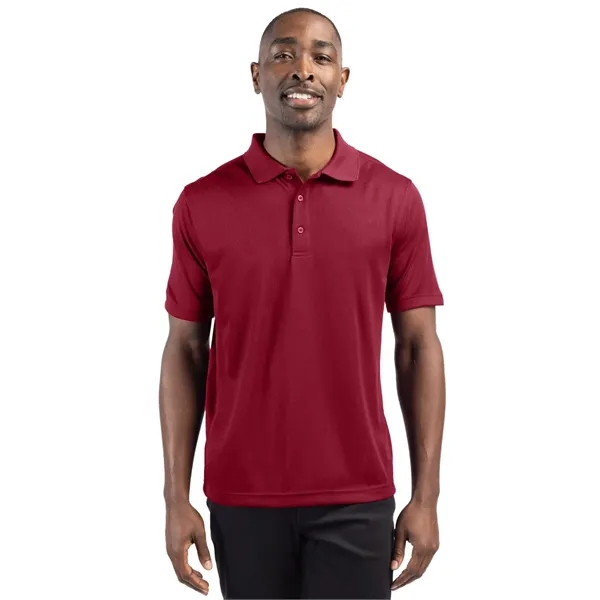 Men's polo with short sleeves, moisture-wicking performance, 3-button placket, and rib-knit... from ASI 47965 Cutter & Buck