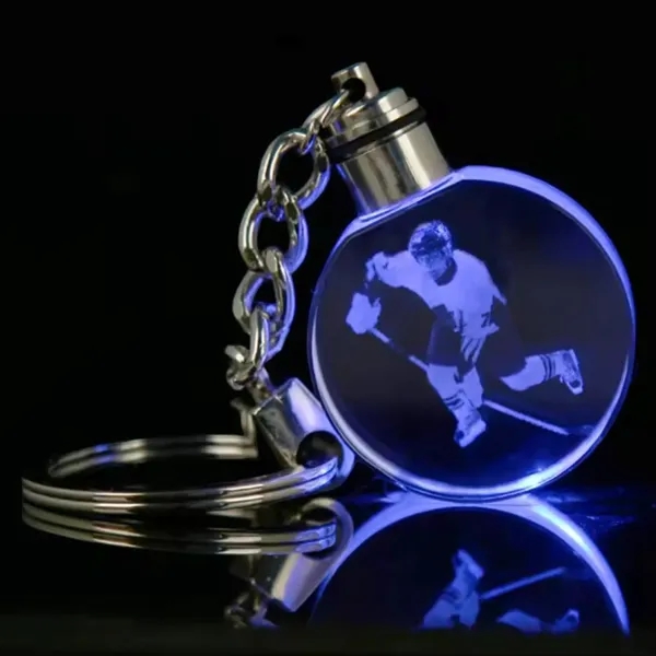 Round LED light crystal keychain plus laser engraving on inside of... from ASI 37218 Athena Promo (tm)
