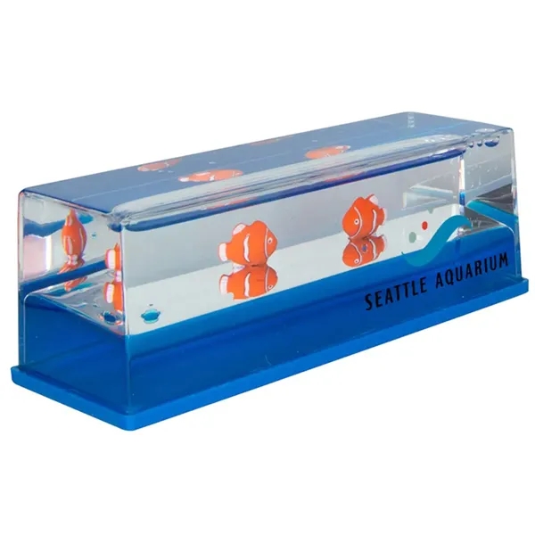 Liquid wave paperweights with blue moving "water" and clownfish.... from ASI 34415 Alpi International LTD