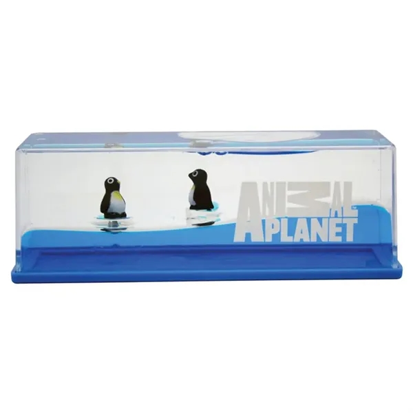 Penguin themed liquid wave paperweight.... from ASI 34415 Alpi International LTD