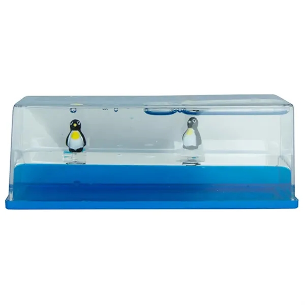 Penguin themed liquid wave paperweight.... from ASI 34415 Alpi International LTD