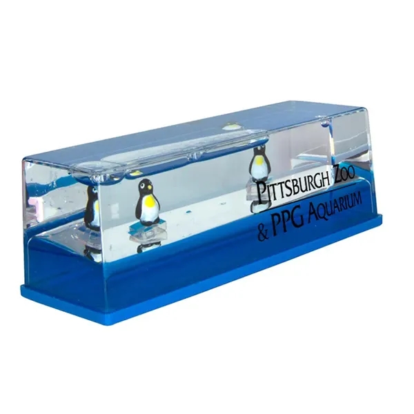 Penguin themed liquid wave paperweight.... from ASI 34415 Alpi International LTD