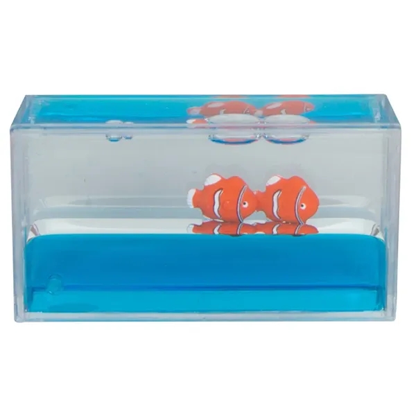 Liquid wave paperweight with blue moving "water" and clownfish.... from ASI 34415 Alpi International LTD