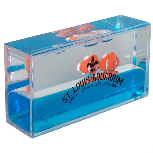 Liquid wave paperweight with blue moving "water" and clownfish.... from ASI 34415 Alpi International LTD