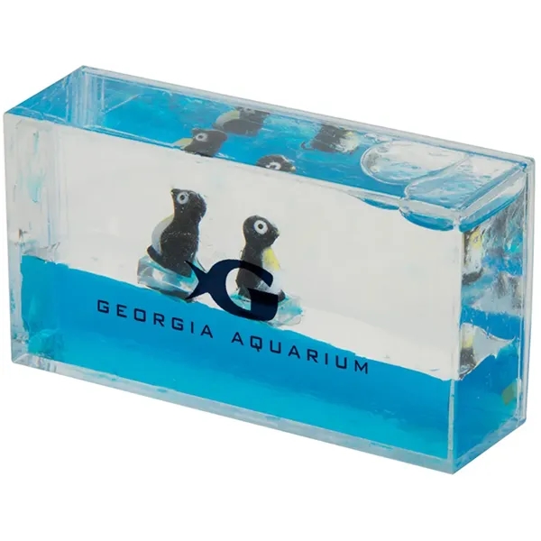 Liquid wave paperweight with penguins.... from ASI 34415 Alpi International LTD