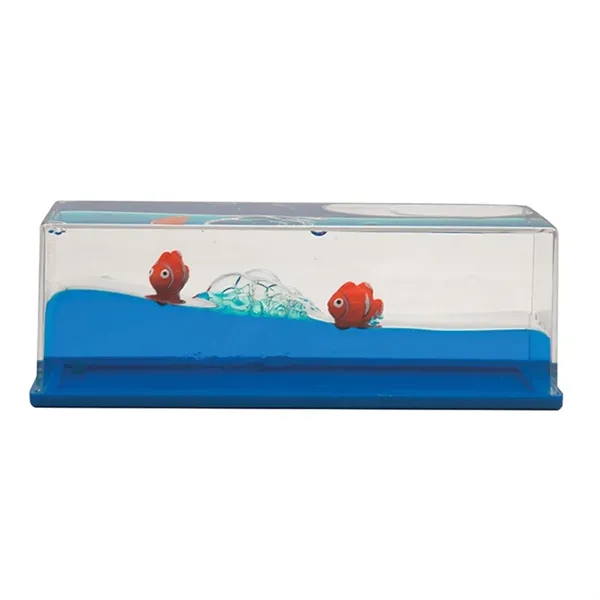 Liquid wave paperweights with blue moving "water" and clownfish.... from ASI 34415 Alpi International LTD