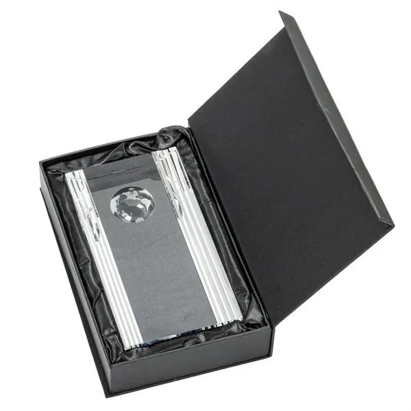 This ridged tower features a globe emblem, symbolic for world class... from ASI 84592 St Regis Group / St Regis