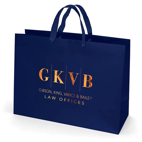 Premium-weight matte-laminated bag with woven handles and fold-over top.... from ASI 37940 Bag Makers Inc