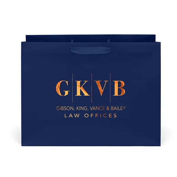 Premium-weight matte-laminated bag with woven handles and fold-over top.... from ASI 37940 Bag Makers Inc