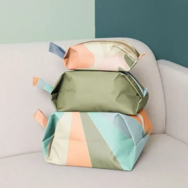 Designed for on-the-go, these pouches expand to carry all your things... from ASI 74710 Numo