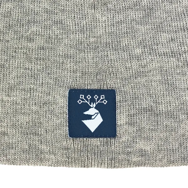 100% acrylic knit beanie decorated with a sewn-on woven patch... from ASI 92980 WOV-IN® / Universal Strap/Wov-In Line