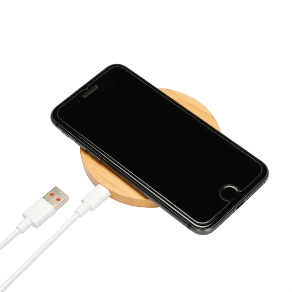 Bamboo 15w Qi wireless puck smartphone charging pad... from ASI 57655 STOPNGO Line