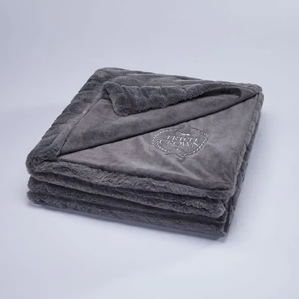 Rich faux leather throw blanket measuring 50" x 60"... from ASI 73520 Neet Feet / Kanata Blanket