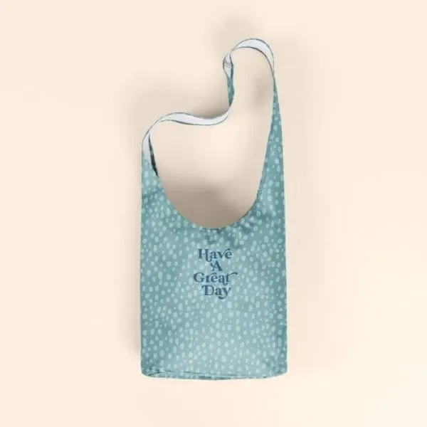 A crossbody, hobo-style tote, this bag fits snugly against your person... from ASI 74710 Numo