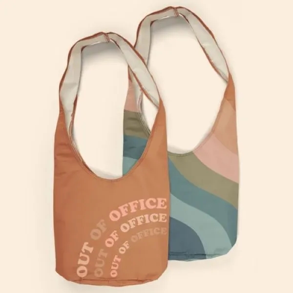 A crossbody, hobo-style tote, this bag fits snugly against your person... from ASI 74710 Numo