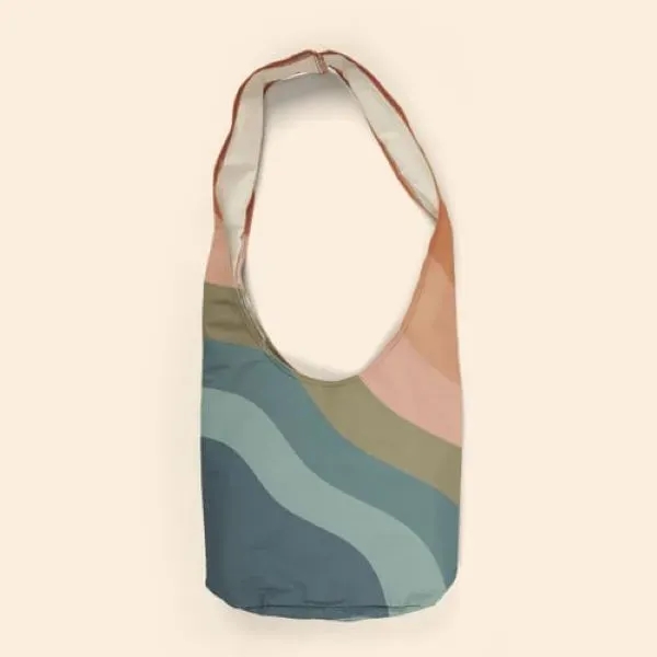 A crossbody, hobo-style tote, this bag fits snugly against your person... from ASI 74710 Numo