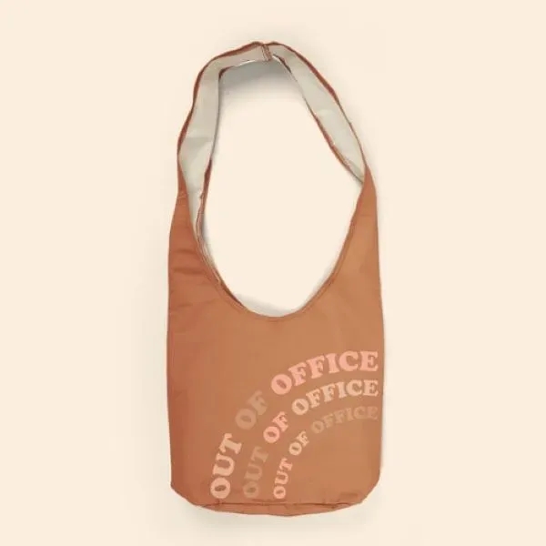 A crossbody, hobo-style tote, this bag fits snugly against your person... from ASI 74710 Numo