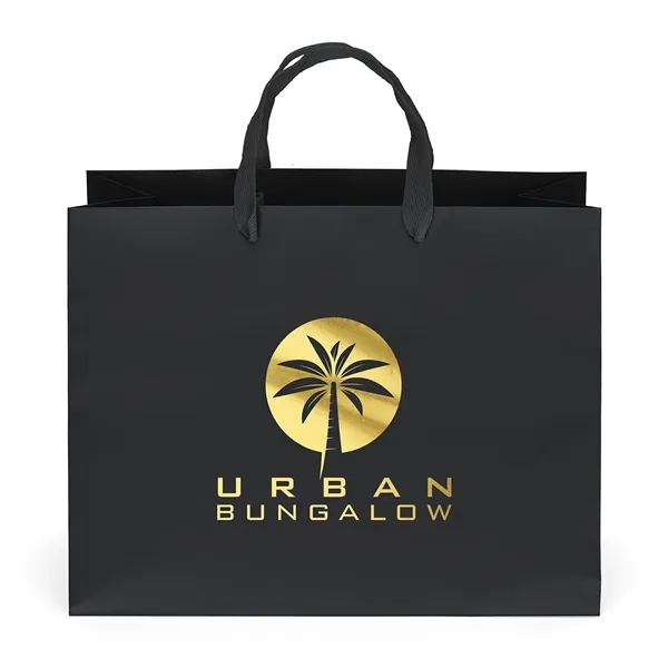 Premium-weight matte-laminated bag with woven handles and fold-over top.... from ASI 37940 Bag Makers Inc