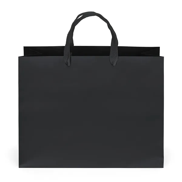 Premium-weight matte-laminated bag with woven handles and fold-over top.... from ASI 37940 Bag Makers Inc