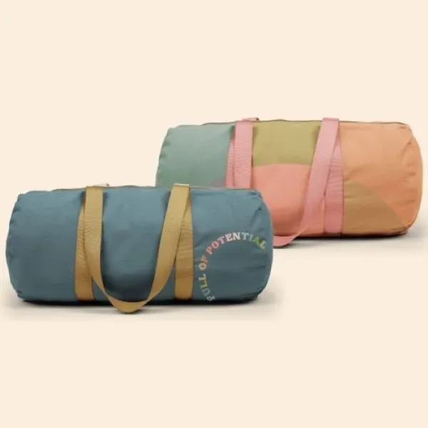 A canvas, barrel body Darling Duffel. It has a huge imprint... from ASI 74710 Numo