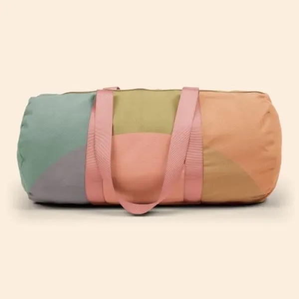 A canvas, barrel body Darling Duffel. It has a huge imprint... from ASI 74710 Numo