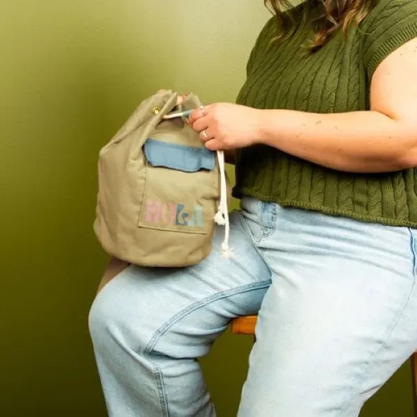 The perfect slouchy sling bag for everyday is featured in a... from ASI 74710 Numo