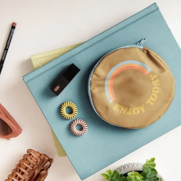 The Pancake Pouch is a circular, flat pouch small enough to... from ASI 74710 Numo