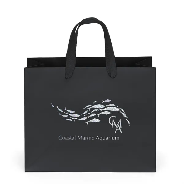 Premium-weight matte-laminated bag with woven handles and fold-over top.... from ASI 37940 Bag Makers Inc