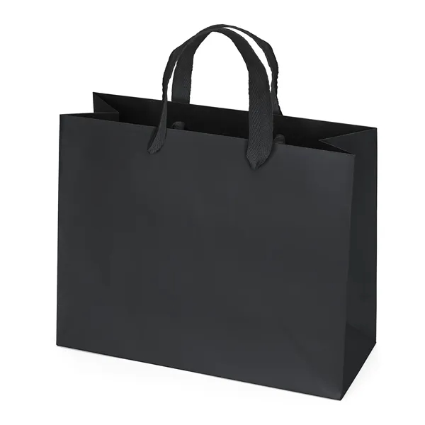 Premium-weight matte-laminated bag with woven handles and fold-over top.... from ASI 37940 Bag Makers Inc