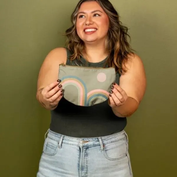 The Slice is a flat, half-moon shaped pouch with a zippered... from ASI 74710 Numo