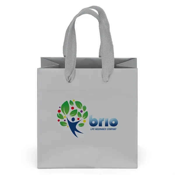 Premium-weight matte-laminated bag with woven handles and fold-over top.... from ASI 37940 Bag Makers Inc