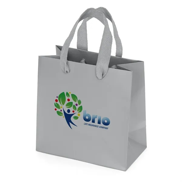 Premium-weight matte-laminated bag with woven handles and fold-over top.... from ASI 37940 Bag Makers Inc