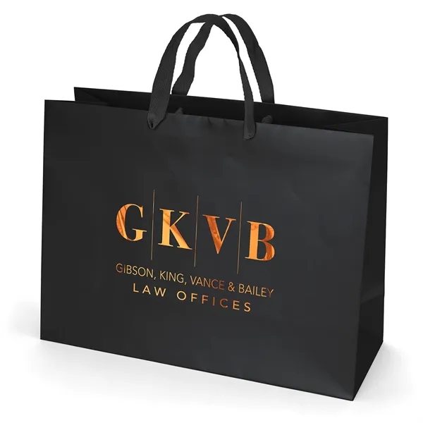 Premium-weight matte-laminated bag with woven handles and fold-over top.... from ASI 37940 Bag Makers Inc