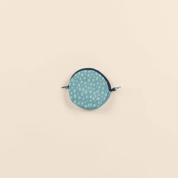 It's a coin purse or a pouch for keeping your purse... from ASI 74710 Numo