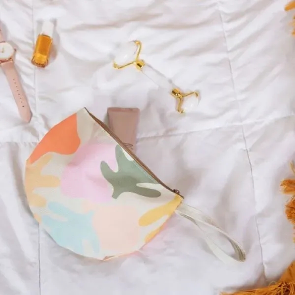 The Slice To Go is a spacious half-moon pouch with a... from ASI 74710 Numo