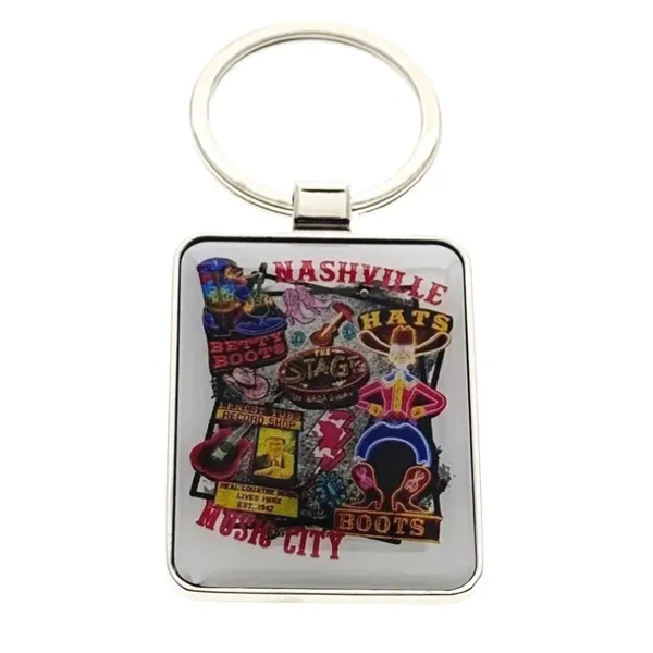 Colossal Keychains with Epoxy Domes... from ASI 40610 Perry Blackburne Inc