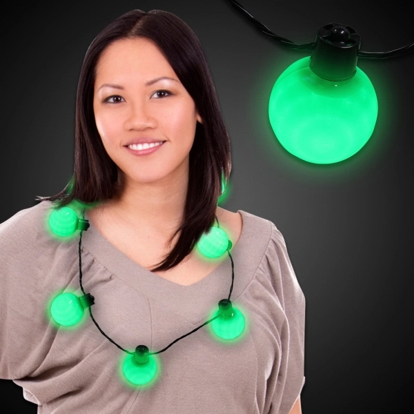 Necklace with 7 plastic white balls, 6 light settings and a... from ASI 42016 Brighter Promotions Inc