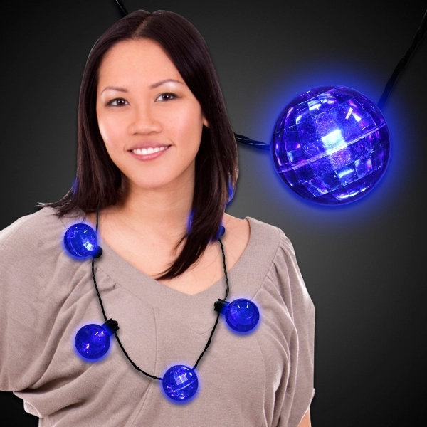 Necklace with 7 plastic white balls, 6 light settings and a... from ASI 42016 Brighter Promotions Inc