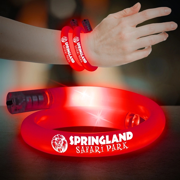 11" plastic coil tube bracelets with flashing LED lights; available in... from ASI 42016 Brighter Promotions Inc
